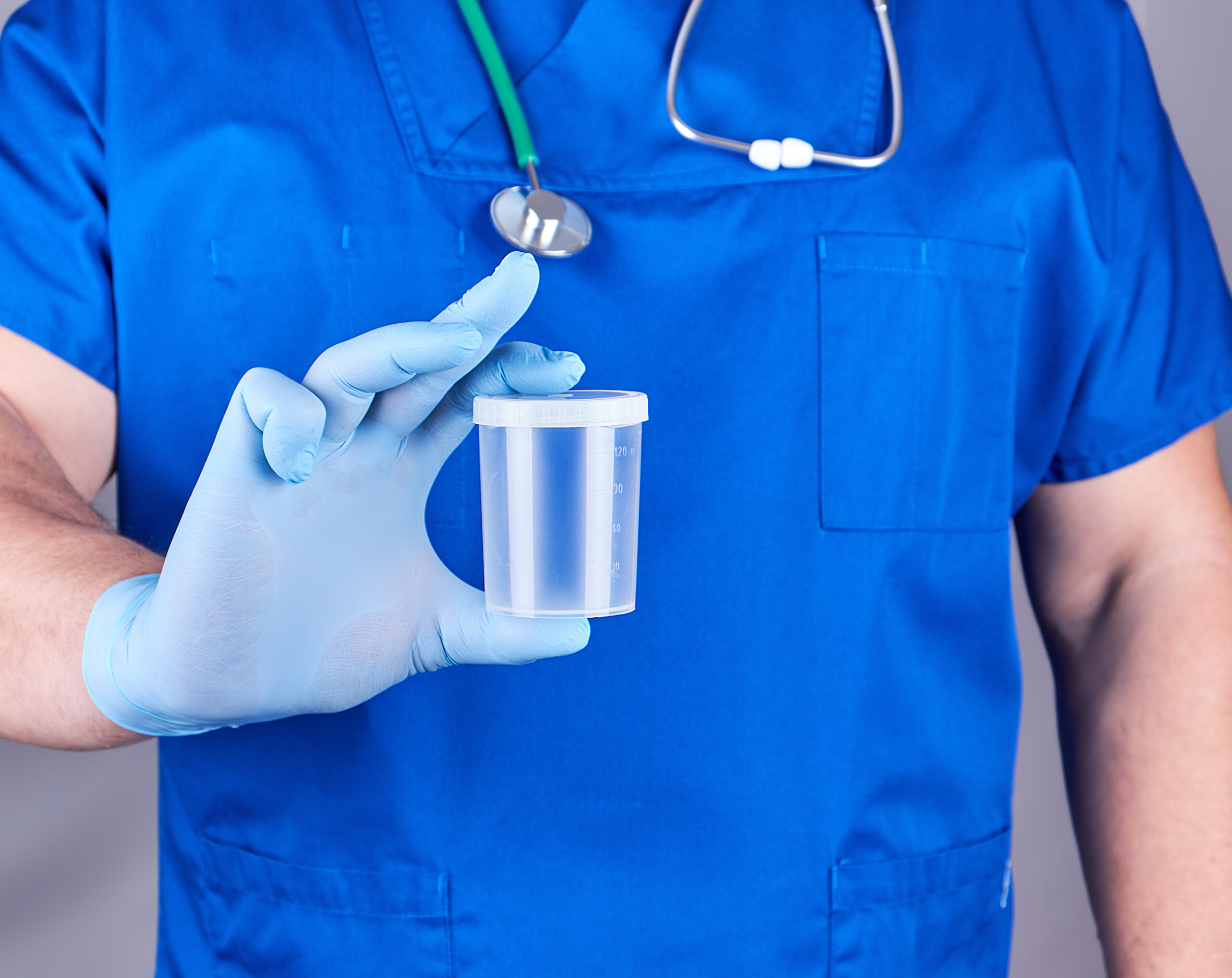 doctor-in-blue-uniform-and-latex-gloves-is-holding-2026-01-11-08-13-56-utc